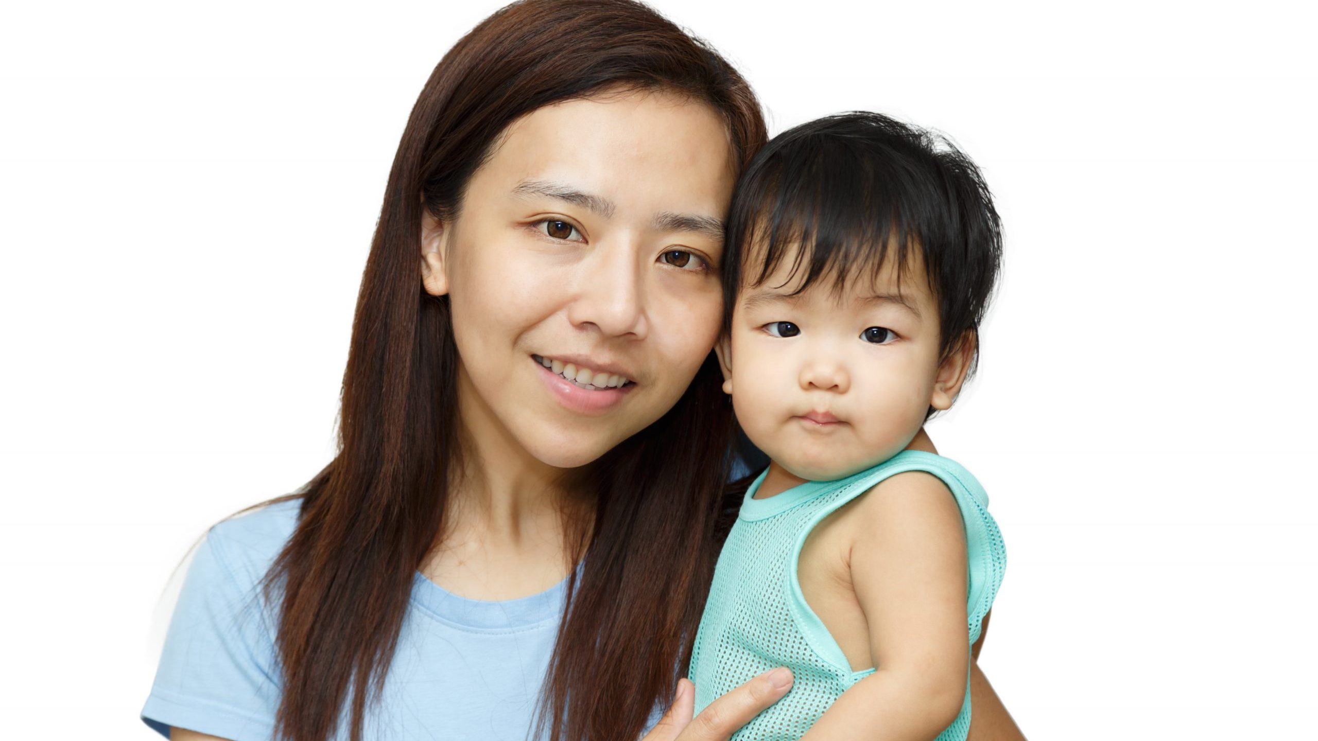 Photograph of a mother holding a baby, looking at camera