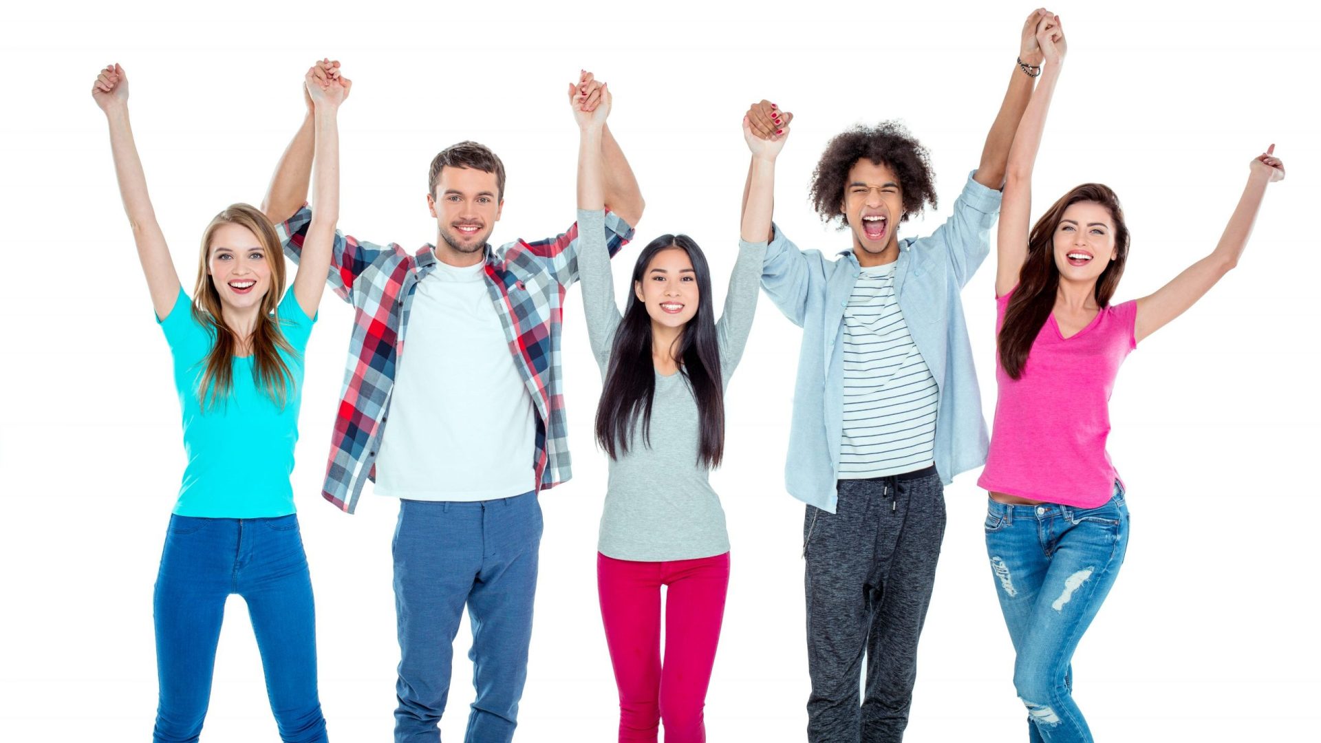 Photograph of youth standing, arms raised