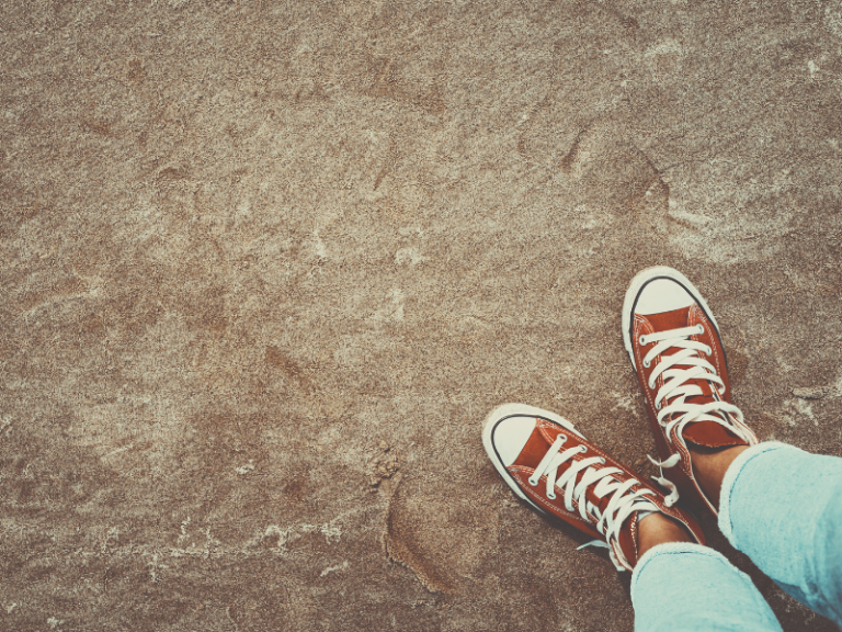 youth-wearing-red-chuck-taylors