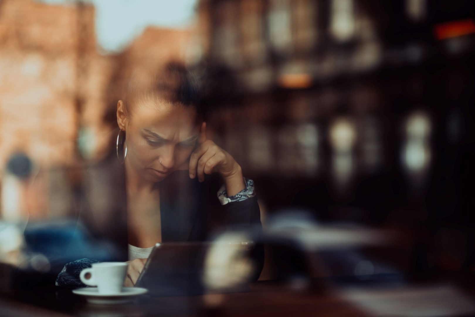 woman sitting in a cafe